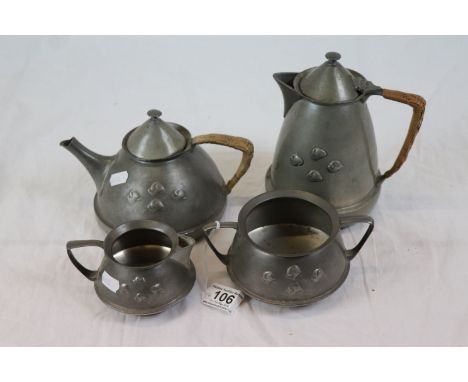 Attributed to Archibald Knox for Liberty & Co Tudric pewter four piece tea service comprising tea pot, hot water pot, sugar b