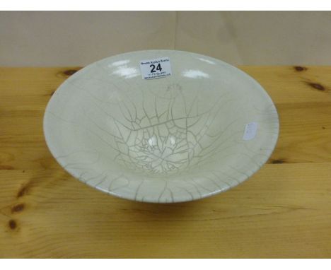 Studio potter bowl in the style of Lucie Rie, flared form, glazed cream lined interior imitating a fracture on matt black foo