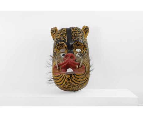 A Danza de los Tecuanes carved and painted wood ceremonial mask, 20th century, Mexican (Guerrero or Puebla), in the form of a