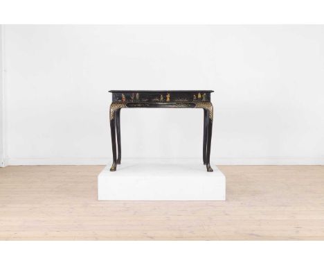 A George I black and gilt japanned side table, early 18th century and later, the rectangular top raised on cabriole supports,