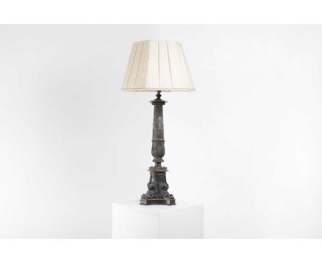An Empire-style ormolu and patinated bronze table lamp, 19th century, the slightly tapered column decorated with classical fi