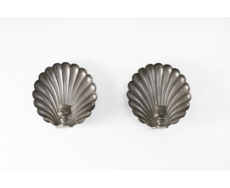 A pair of pewter wall sconces, 20th century, German, each in the form of a scallop shell, 15cm wide5cm deep15cm high (2)Condi