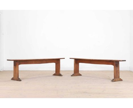 A pair of chestnut benches, 19th century, French, each of joined construction with a plank top raised on stile supports, 169c