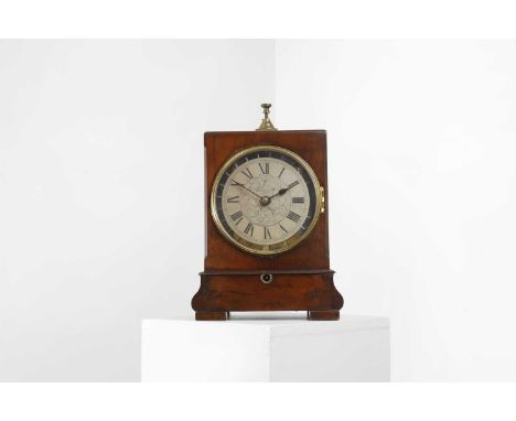 A mahogany 'noctuary' or 'night watchman's' mantel clock, c.1850, the silvered dial with Roman numerals and foliate engraving