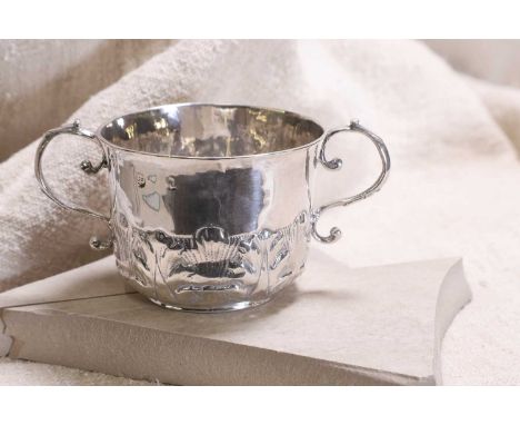 A provincial silver porringer, maker's mark possibly crowned 'MB', 17th century, York,with cast acanthus leaves rising halfwa