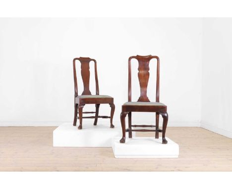 A pair of George II walnut side chairs, c.1730, each vase-shaped splat above a drop-in seat, raised on cabriole supports unit