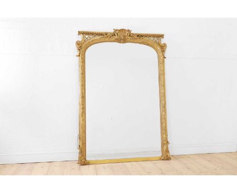 A Louis XV-style giltwood and gesso overmantel mirror, 19th century, French, the arched rectangular plate within a moulded fr