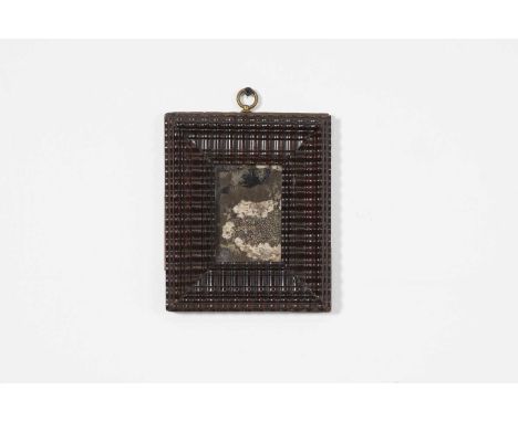 A small ebony mirror, late 17th century, Italian, the rectangular mercury glass plate within a finely ripple-moulded frame,15