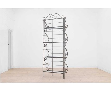 A fer forgé four-tier boulangerie stand, 20th century, French, with scrolling decoration and four glass shelves, 76cm wide37c