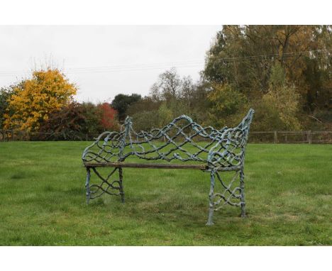 A Victorian painted cast iron garden bench, second half of the 19th century, probably after a design by Andrew McLaren &amp; 