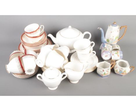 A box of teasets includes: 21 pieces Wedgwood "Signet Gold" 6 sets tea service, 25 pieces Royal Grafton “Majestic" plates, bo