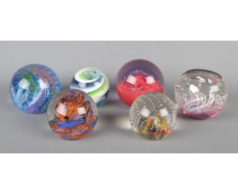 Five Caithness glass paperweights. Includes Inferno, Reflections, Brimstone, Dizzy, Lilac Pool and Fiesta.