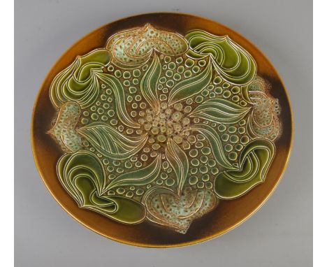 A Poole pottery charger in the Ionian design, bearing artist signature 'D.D' to reverse. Approx. diameter 42cm.