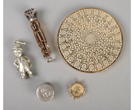 A small quantity of collectables to include Priaur EPNS leprechaun rattle, vintage scent bottle, Vogue powder compact, etc.