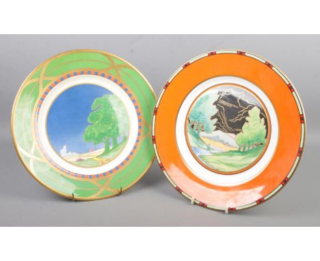 Two Royal Worcester The Art Deco Collection plates decorated in the Blue Lagoon and Lazy Days designs. Diameter 31cm.