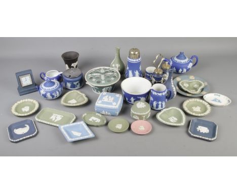 A collection of Wedgwood Jasperware ceramics, to include cruet set, sugar shaker, trinket dishes, quartz clock, teapot, milk 