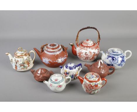 Nine mixed vintage Chinese &amp; Japanese clay and ceramic teapots, some of them have bottom marks  one of the clay teapot li