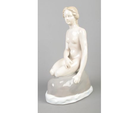 A Copenhagen ceramic mermaid figure; 'By the Sea'. Bearing crown to base and 1801 impressed mark. Height: 24cm  Index figure 