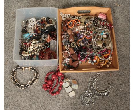 Two boxes of assorted costume jewellery, to include bracelets, beaded necklaces, bangles and Stratton tie clip formed as a cr