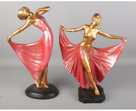 A pair of 1930's Leonardi Art Deco plaster figures of female dancers having pink dress on a patinated bronze body and black p