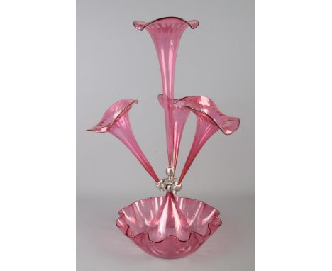 A cranberry glass epergne. Height 49cm.