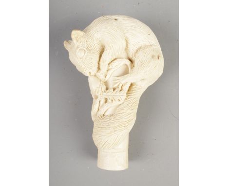 A vintage ceramic walking stick pommel formed as a squirrel with acorn. Signed P.J.O.