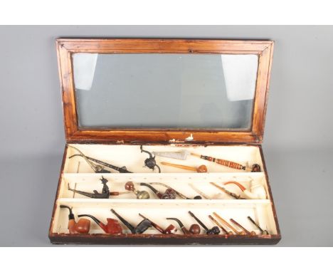 Mixed collection of 22 pipes come with a wood cabinet display, including variety of meerschaum, wood, briar, stone and metal 