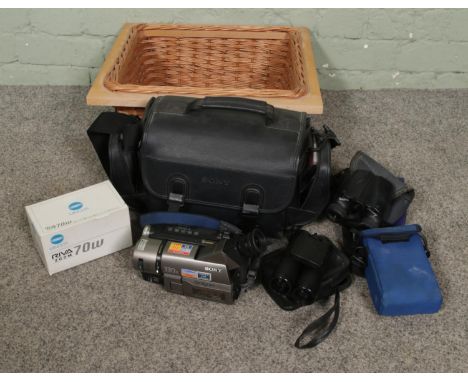 A collection of cameras and binoculars to include Sony Handycam Video CCD-TRV36E, Pentax Zoom 70-R, Halina Discovery, etc.