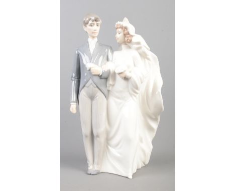 Large Nao figurine of bride and groom. Hx30.5cm