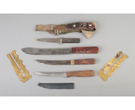 Four assorted knives, to include Chicago Cutlery and example with chequered grip with sheath, along with two brass button sti