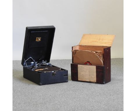 A vintage HMV wind up gramophone, together with a collection of records