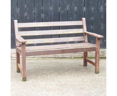 A hardwood slatted garden bench, 131cm