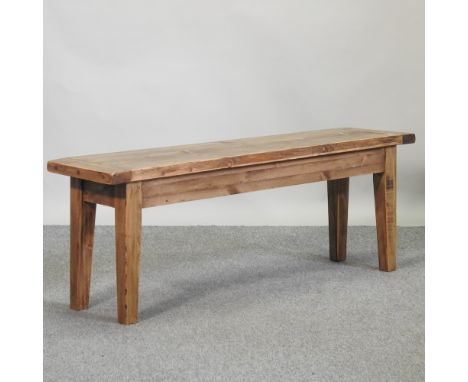 A rustic pine bench, 133cm