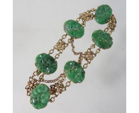 A 9 carat gold and jade coloured hardstone bracelet