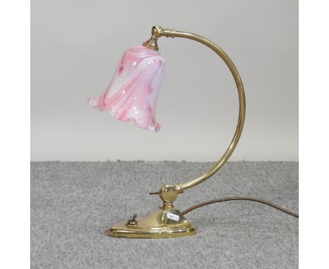 A Christopher Wray brass desk lamp, with a pink shade, 40cm high