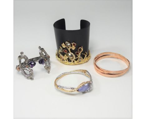 A Stephen Webster ornate hinged silver bangle, together with a large Alexis Bittar black and gilt cuff, a bangle by the same 