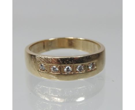 A 14 carat gold half hoop eternity ring, set with five diamonds, boxed, size M/N