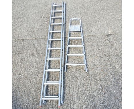 An aluminium two part extending ladder, each 300cm, together with a folding stepladder