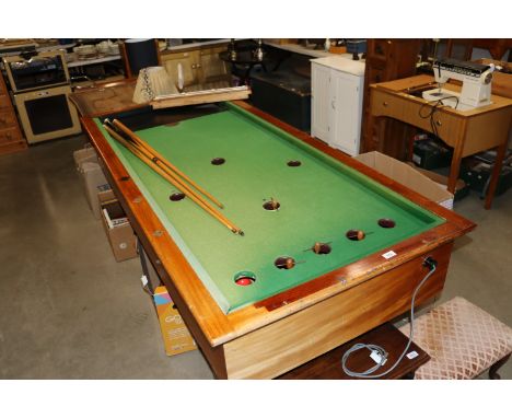 A vintage bar billiard table