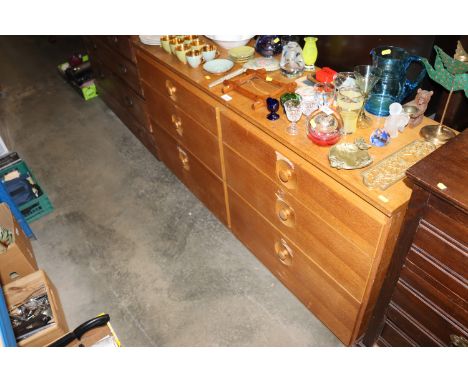 A light wood six drawer chest 