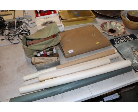 An artists travelling sketch bag, another box of various paints, artists paper etc.
