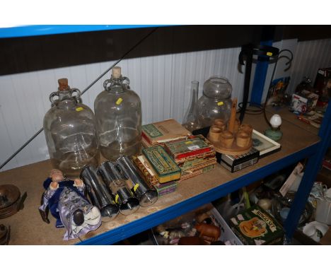 A collection of vintage cigar boxes and advertising tins; a circa 1970's cassette player; glass demi-johns; clock weights etc