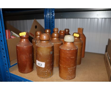 A collection of vintage stoneware bottles 