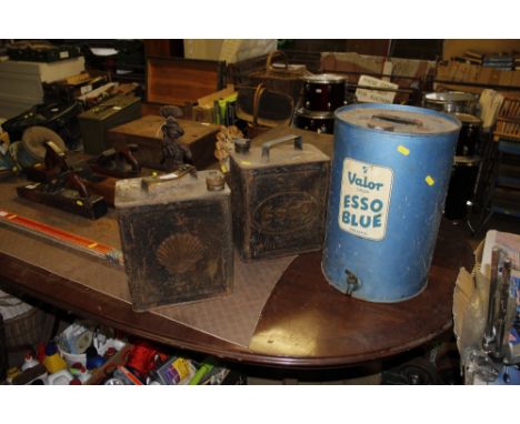 A Valor Esso blue paraffin can, Esso petrol can and Shell petrol can 