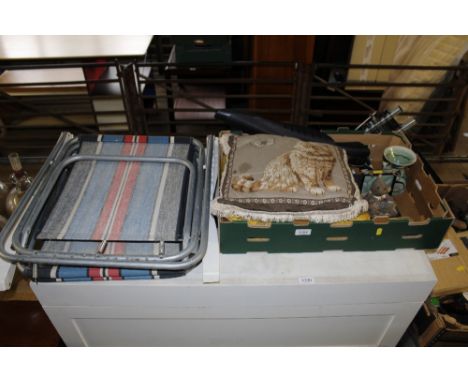 Two folding garden chairs and a box containing cushions, playing card box, cycle mud guards etc.