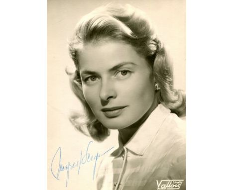 BERGMAN INGRID: (1915-1982) Swedish actress, Academy Award winner. A good vintage signed 4 x 6 photograph of Bergman in a cha