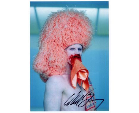 BARNEY MATTHEW: (1967-     ) American contemporary artist and film director. Signed colour 5 x 7 photograph of Barney in a ha