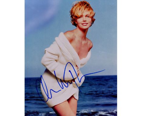 THERON CHARLIZE: (1975-     ) South African actress, Academy Award winner. Signed colour 8 x 10 photograph, a glamorous image