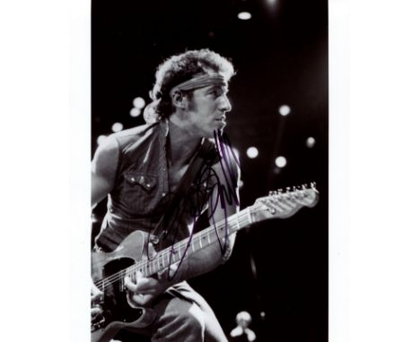 SPRINGSTEEN BRUCE: (1949- ) American Rock Singer and Guitarist. Signed 8 x 10 photograph by The Boss, the image showing Sprin