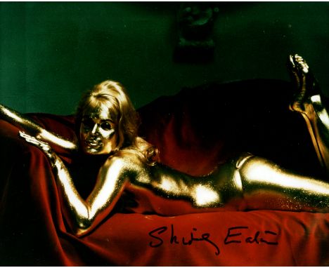 GOLDFINGER: Shirley Eaton (1937-&nbsp;&nbsp;&nbsp;&nbsp; ) English actress. Signed colour 10 x 8 photograph of Eaton lying in